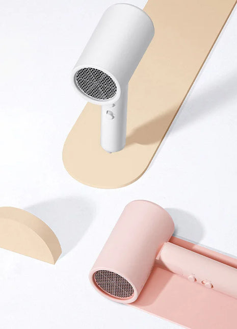 XIAOMI MIJIA H101 Portable Hair Dryer – 1600W,Foldable,50M Negative Ions,15m/s Airflow,Dual Heat & Speed Modes,220V With adapter - Riparo82
