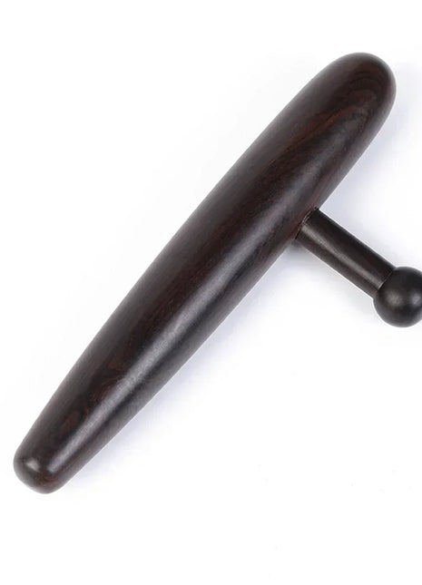 Top view of handcrafted wooden massage tool