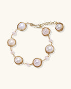 14K gold plated bracelet featuring wire-wrapped freshwater pearls in nest-like settings with adjustable chain closure