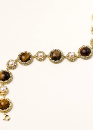 Ornate gold-plated bracelet with alternating brown tiger's eye stones and white freshwater pearls in crystal-accented settings