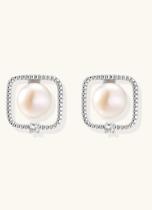 Square sterling silver stud earrings with freshwater pearls and crystal accents on white background.