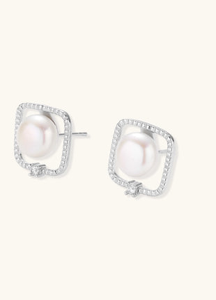 Square sterling silver stud earrings with freshwater pearls and crystal accents on white background.