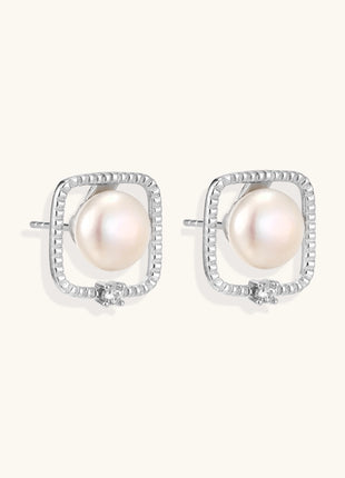Square sterling silver stud earrings with freshwater pearls and crystal accents on white background.