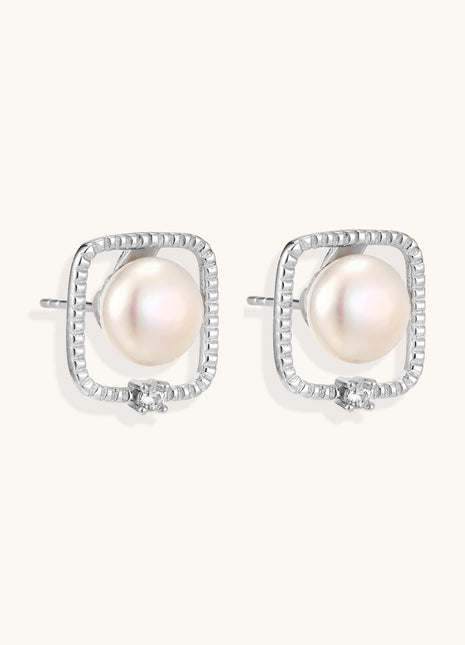 Square sterling silver stud earrings with freshwater pearls and crystal accents on white background.