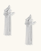 Gold-plated wing earrings with delicate chain fringe tassels creating movement and celestial appeal