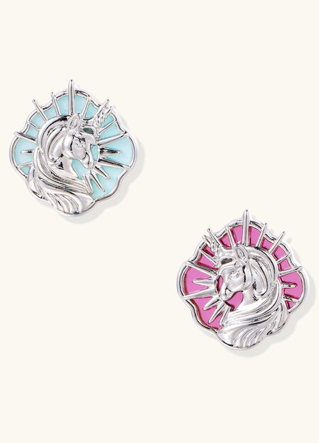 Two unicorn-shaped stud earrings with radiating spikes, one with turquoise stone and one with pink stone, on white background.