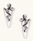 Gold-plated brass statement earrings featuring cross pendants with serpent details and hanging chains