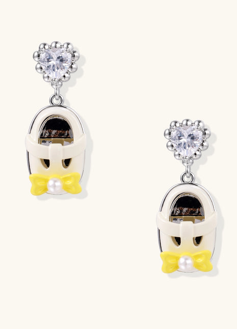 18K gold plated drop earrings with heart-shaped zirconia studs and translucent mini handbag pendants with pearl accents