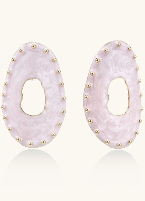 Oval lavender enamel earrings with gold studs around perimeter and cutout centers on white background