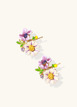 Delicate gold-plated stud earrings featuring white daisy and purple flowers with green leaves and crystal accents
