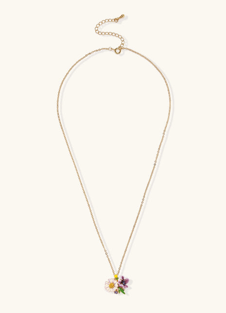 Delicate 18K gold plated necklace featuring colorful enamel flowers in pink and white with green leaves on chain