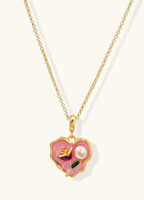Gold-plated heart pendant necklace with pink enamel rose design and freshwater pearl on adjustable chain