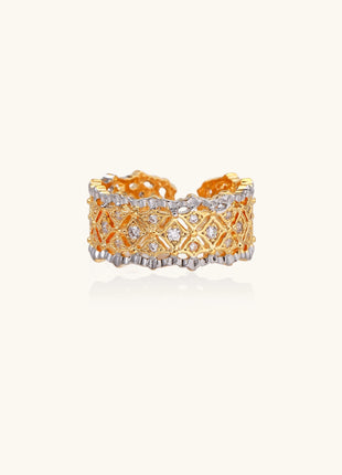 Bold geometric ring with lattice pattern in gold-plated brass featuring multiple tiers of sparkling zirconia stones