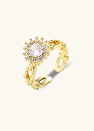 Two gold-plated rings with cubic zirconia halo design and chain-link band on white background, adjustable sizing.