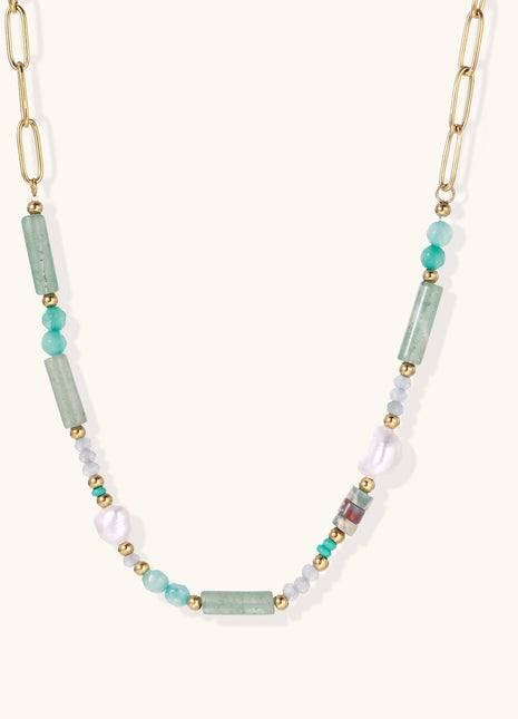 Gold-plated chain necklace with green prasem quartz, freshwater pearls, and mixed beads in modern asymmetrical design
