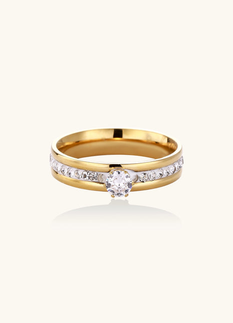 14K gold plated ring with center rhinestone and accent stones along the band on white background.