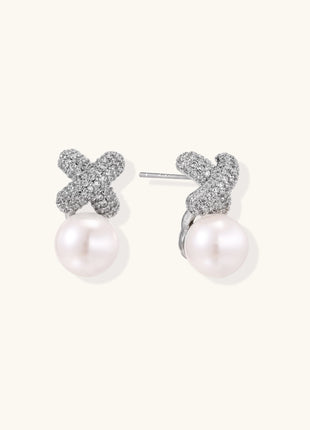Elegant drop earrings with pavé crystal cross tops and round freshwater pearls on 14K gold plated brass setting.