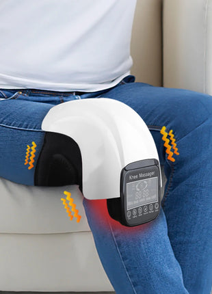 Electric knee massager with LED display on user’s leg