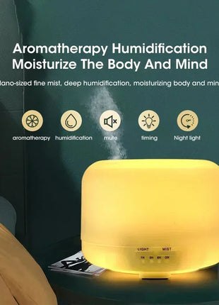 Humidifier with essential oils arranged beside it