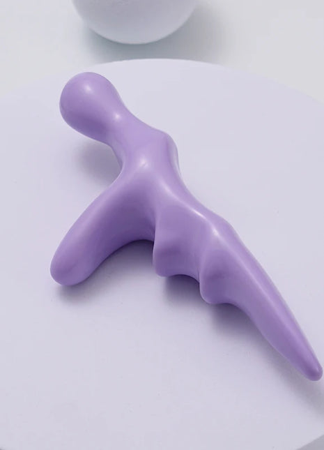 Person gripping tool between fingers for control