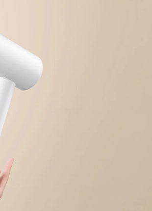 XIAOMI MIJIA H101 Portable Hair Dryer – 1600W,Foldable,50M Negative Ions,15m/s Airflow,Dual Heat & Speed Modes,220V With adapter - Riparo82