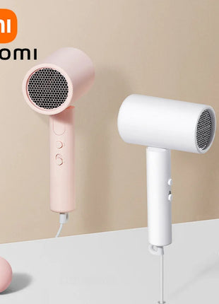 XIAOMI MIJIA H101 Portable Hair Dryer – 1600W,Foldable,50M Negative Ions,15m/s Airflow,Dual Heat & Speed Modes,220V With adapter - Riparo82
