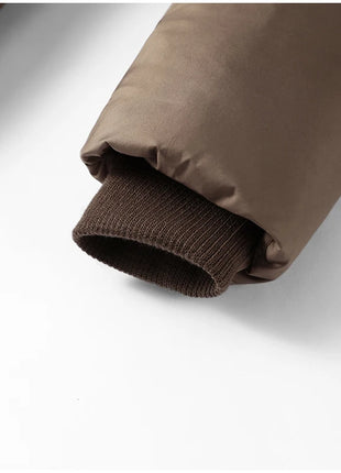 Cappotto lungo in cotone con cappuccio trapuntato imbottito da donna caldo Colletto alla coreana solido allentato Cappotti con cerniera con lacci 2025 Capispalla invernale da donna