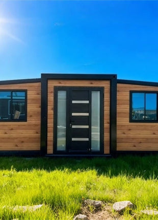 Rivestimento in legno Contenitore Casa Grandi finestre di vetro Cabina modulare prefabbricata Soggiorno all'aperto Casa Vacanza Casa Soggiorno in famiglia Prendisole