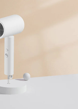 XIAOMI MIJIA H101 Portable Hair Dryer – 1600W,Foldable,50M Negative Ions,15m/s Airflow,Dual Heat & Speed Modes,220V With adapter - Riparo82