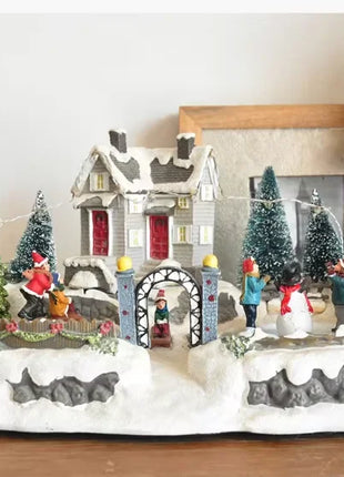 Fornitore di decorazioni natalizie Casa del villaggio musicale a LED Albero di Natale che gira il treno sportivo Statua di Natale