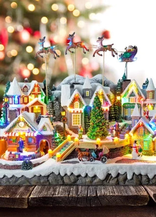 Fornitore di decorazioni natalizie Casa del villaggio musicale a LED Albero di Natale che gira il treno sportivo Statua di Natale