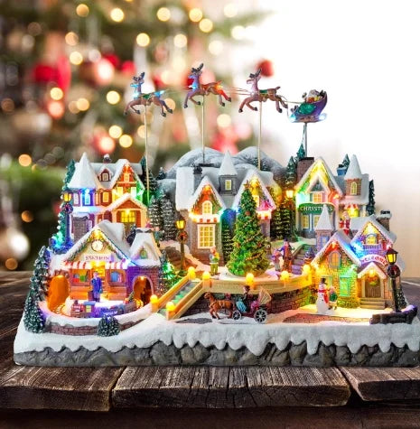 Fornitore di decorazioni natalizie Casa del villaggio musicale a LED Albero di Natale che gira il treno sportivo Statua di Natale