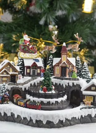 Fornitore di decorazioni natalizie Casa del villaggio musicale a LED Albero di Natale che gira il treno sportivo Statua di Natale