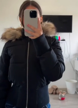 Giacca corta chic con tasca con cerniera a maniche lunghe Cappotto trapuntato con cappuccio in pelliccia sintetica da donna di moda 2025 Capispalla imbottito invernale New Lady