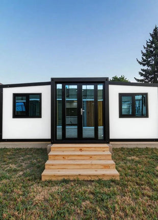 Rivestimento in legno Contenitore Casa Grandi finestre di vetro Cabina modulare prefabbricata Soggiorno all'aperto Casa Vacanza Casa Soggiorno in famiglia Prendisole