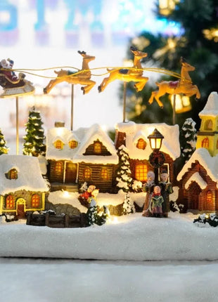 Fornitore di decorazioni natalizie Casa del villaggio musicale a LED Albero di Natale che gira il treno sportivo Statua di Natale