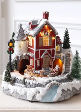 Fornitore di decorazioni natalizie Casa del villaggio musicale a LED Albero di Natale che gira il treno sportivo Statua di Natale