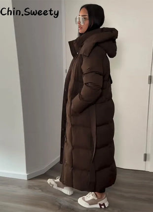 Cappotto lungo in cotone con cappuccio trapuntato imbottito da donna caldo Colletto alla coreana solido allentato Cappotti con cerniera con lacci 2025 Capispalla invernale da donna
