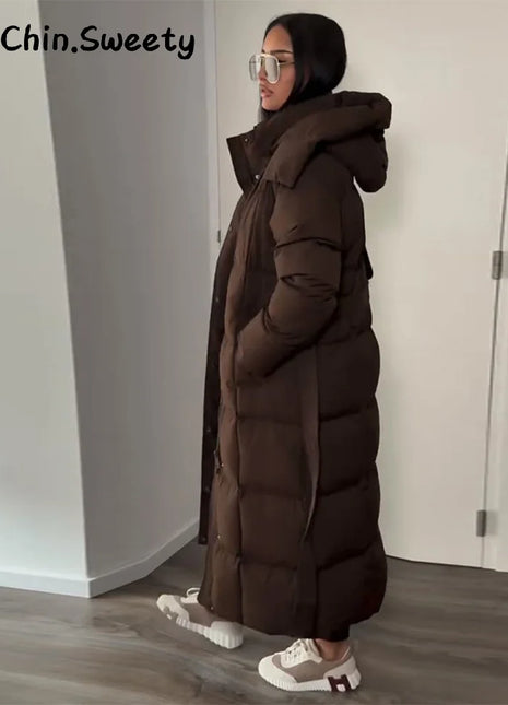 Cappotto lungo in cotone con cappuccio trapuntato imbottito da donna caldo Colletto alla coreana solido allentato Cappotti con cerniera con lacci 2025 Capispalla invernale da donna