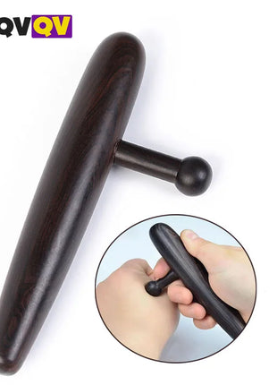 Sandalwood acupressure massage tool on hand