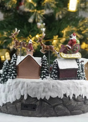 Fornitore di decorazioni natalizie Casa del villaggio musicale a LED Albero di Natale che gira il treno sportivo Statua di Natale