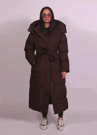 Cappotto lungo in cotone con cappuccio trapuntato imbottito da donna caldo Colletto alla coreana solido allentato Cappotti con cerniera con lacci 2025 Capispalla invernale da donna