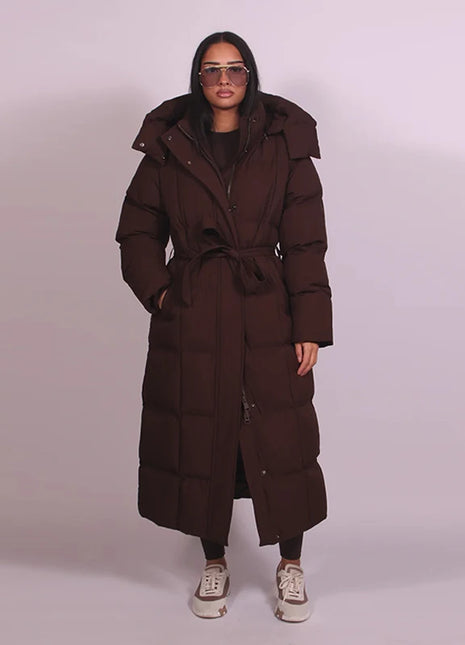 Cappotto lungo in cotone con cappuccio trapuntato imbottito da donna caldo Colletto alla coreana solido allentato Cappotti con cerniera con lacci 2025 Capispalla invernale da donna