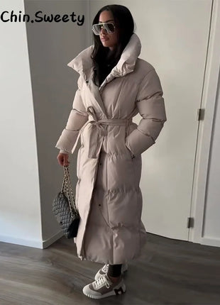 Cappotto lungo in cotone con cappuccio trapuntato imbottito da donna caldo Colletto alla coreana solido allentato Cappotti con cerniera con lacci 2025 Capispalla invernale da donna