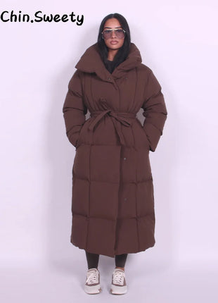 Cappotto lungo in cotone con cappuccio trapuntato imbottito da donna caldo Colletto alla coreana solido allentato Cappotti con cerniera con lacci 2025 Capispalla invernale da donna