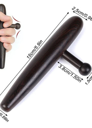 Thumb applying downward pressure with massage tool