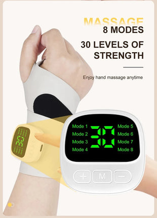 User sitting at desk using wrist massager