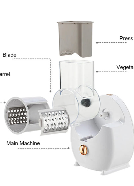 White one-touch kitchen slicer in action with grated vegetables
