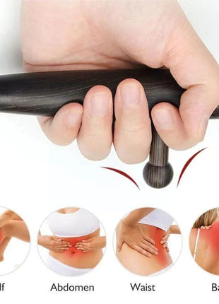 Wooden trigger point massager on folded towel